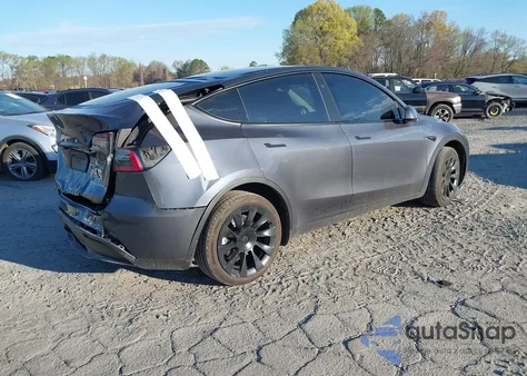 2023 Tesla Model Y из США, поврежденный, VIN 7SAYGDEE5PF834774